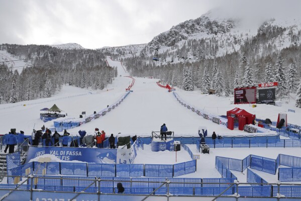 A view of the finish area as an alpine ski, women's World Cup super G race, was cancelled due to the excess of snow in Val di Fassa, Italy, Saturday, Feb. 24, 2024. (AP Photo/Marco Trovati)