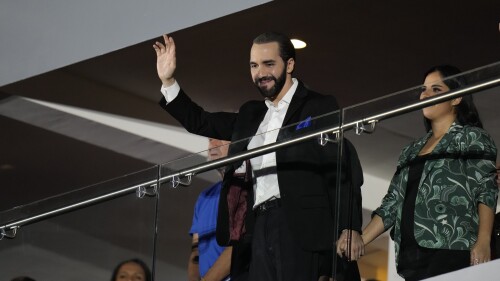 Salvadoran President Nayib Bukele waves during the opening ceremony of the Central American and Caribbean Games, in San Salvador, El Salvador, Friday, June 23, 2023. (AP Photo/Arnulfo Franco)