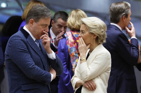 European Commission President Ursula von der Leyen, right, speaks with Belgium's Prime Minister Bart De Wever during a round table meeting at an EU Summit in Brussels, Thursday, March 6, 2025. (AP Photo/Geert Vanden Wijngaert)