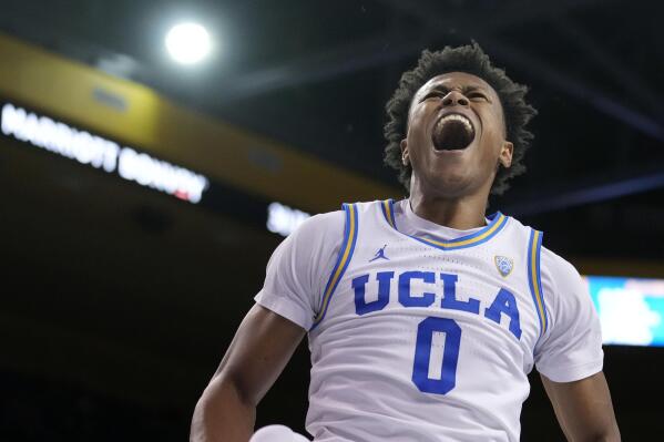 UCLA guard Jaylen Clark (0) celebrates after dunking against Sacramento State during the second half of an NCAA college basketball game Monday, Nov. 7, 2022, in Los Angeles. (AP Photo/Marcio Jose Sanchez)