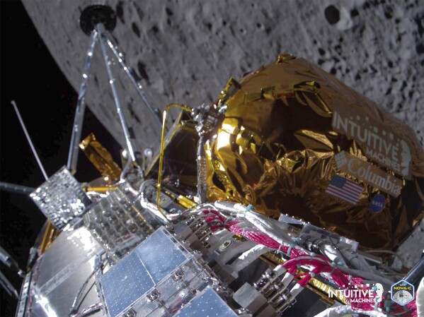 FILE - This image provided by Intuitive Machines shows its Odysseus lunar lander over the near side of the moon following lunar orbit insertion, Wednesday, Feb. 21, 2024. Intuitive Machines reported Friday, Feb. 23, 2024, that it’s communicating with its lander, Odysseus, and sending commands to acquire science data. But it noted: “We continue to learn more about the vehicle’s specific information” regarding location, overall health and positioning. (Intuitive Machines via AP, File)