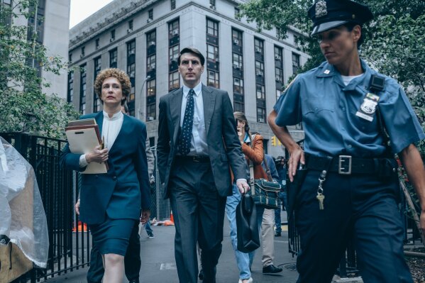 This image released by Netflix shows Vera Farmiga as Elizabeth Lederer, left, and Alex Breaux as Tim Clements in a scene from "When They See Us." (Atsushi Nishijima/Netflix via AP)