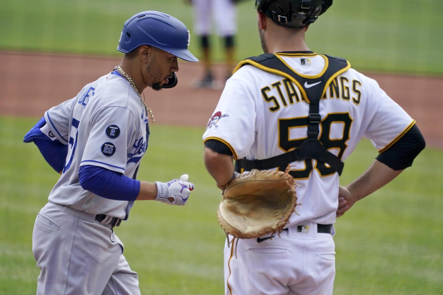 Betts' leadoff homer, catch, throw lift Dodgers over Pirates