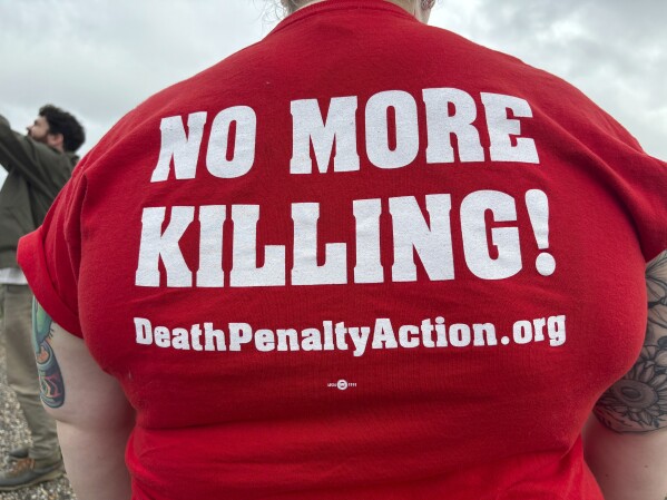 Anti-death penalty activists protest in front of the Holman Correctional Facility in Atmore, Ala., on Jan. 25, 2024. (AP Photo/Kim Chandler, File)