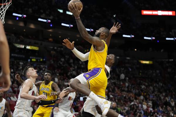 Lakers' LeBron James slam-dunks father time in his 21st NBA season