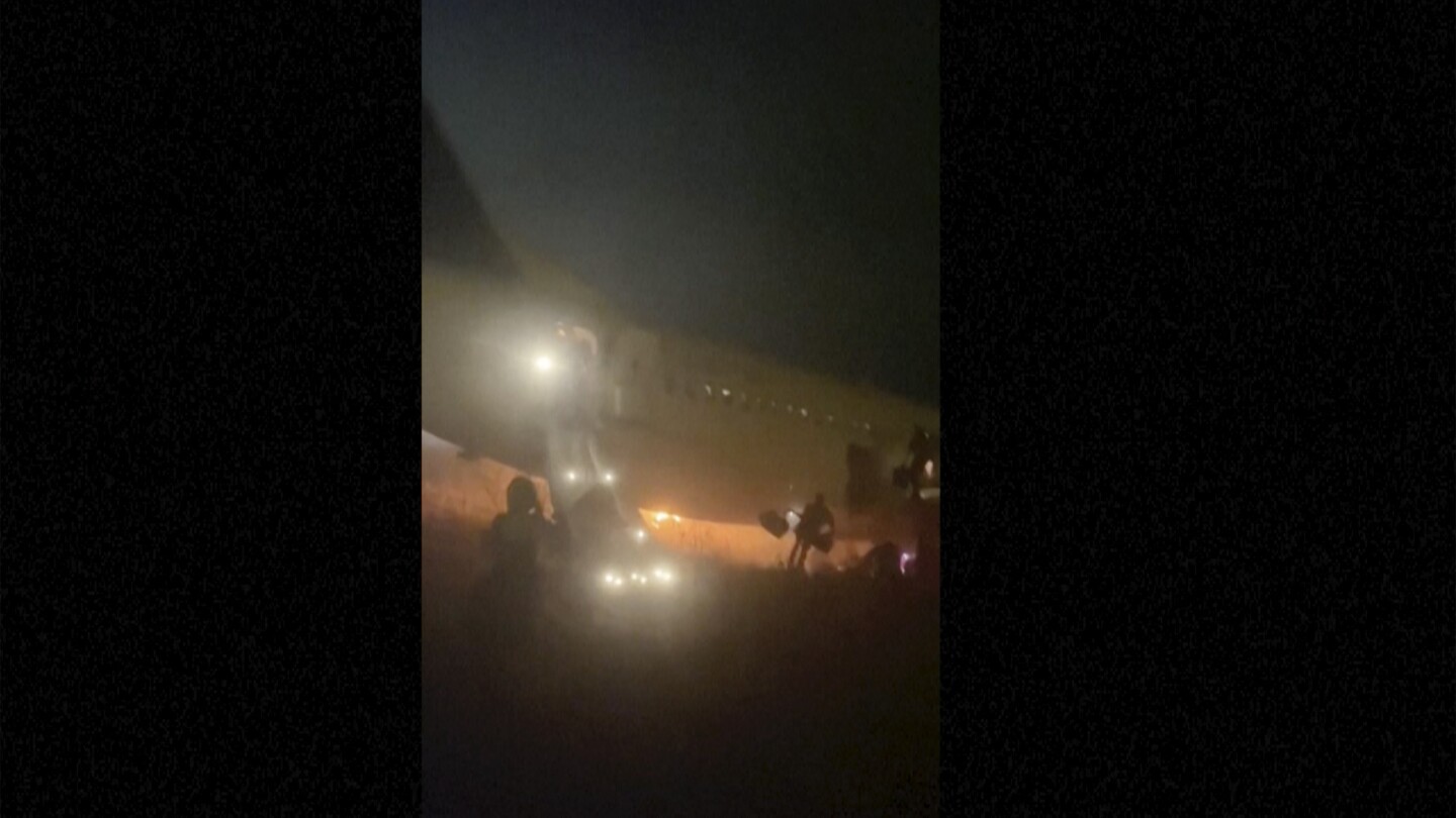 A Boeing 737 caught fire and skidded off the runway in Senegal, injuring 10 people.