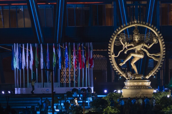 An Illuminated statue of Nataraja, the Hindu god of Dance, stands at the entrance of the main venue for the G20 summit in New Delhi, India, Thursday, Sept. 7, 2022. Leaders of the Group of 20 are gathering in New Delhi this weekend for their annual summit. (AP Photo/Dar Yasin)