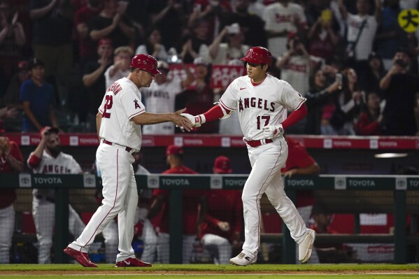 Ohtani, Cabbage lead Angels to 13-12 win over Astros in 10 innings - The  San Diego Union-Tribune