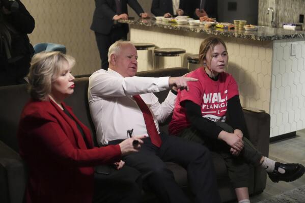 Minnesota Gov. Tim Walz sits with his wife, Gwen, and daughter, Hope, as they watch election returns Tuesday, Nov. 8, 2022, in St. Paul, Minn. (Glen Stubbe/Star Tribune via AP)