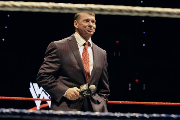 FILE - WWE chairman and CEO Vince McMahon speaks to an audience during a WWE fan appreciation event, Oct. 30, 2010, in Hartford, Conn. A former WWE employee filed a federal lawsuit Thursday, Jan. 25, 2024, accusing McMahon and another former executive of serious sexual misconduct. (AP Photo/Jessica Hill, File)