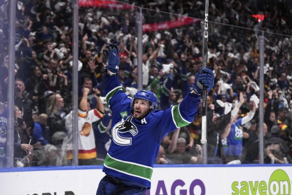 Vancouver Canucks' J.T. Miller celebrates his goal against the Edmonton Oilers during the third period of Game 5 of an NHL hockey Stanley Cup second-round playoff series, Thursday, May 16, 2024, in Vancouver, British Columbia. (Darryl Dyck/The Canadian Press via Ǻ)