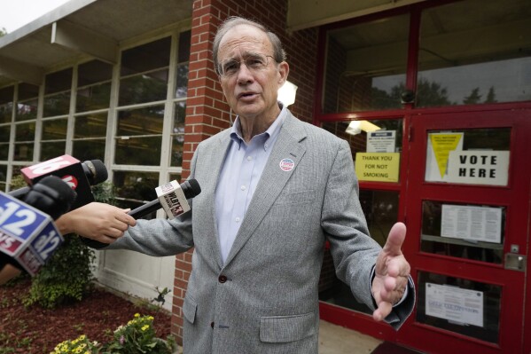 Republican Lt. Gov. Delbert Hosemann speaks to reporters after voting in the party primary at his precinct in Jackson, Miss., Tuesday, Aug. 8, 2023. Hosemann who is seeking reelection, faces two opponents in the party primary. (AP Photo/Rogelio V. Solis)