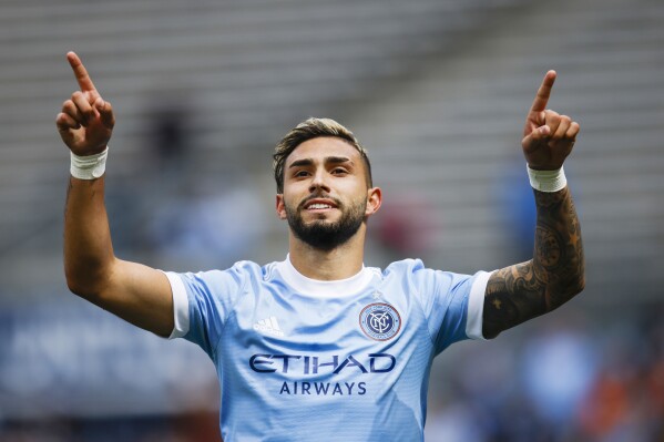 FILE - New York City FC forward Valentin Castellanos celebrates after scoring his fourth goal in the second half of an MLS soccer match against Real Salt Lake at Yankee Stadium in New York, Sunday, April 17, 2022. Castellanos, Major League Soccer's scoring leader in 2021, transferred Friday, July 21, 2023, to Lazio from New York City. (AP Photo/Eduardo Munoz Alvarez)