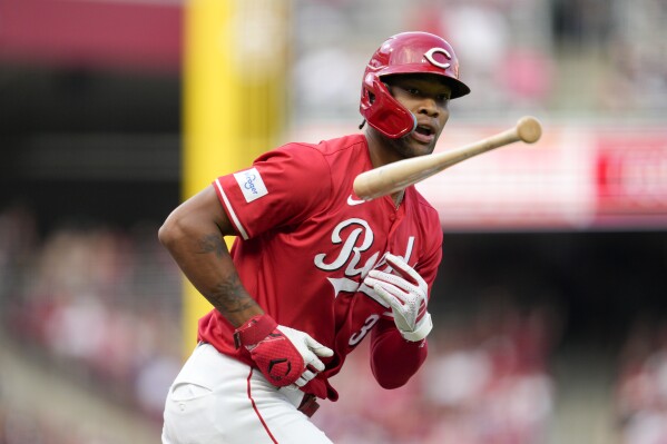 Cincinnati Reds' Will Benson tosses his bat after hitting a solo home run against the Los Angeles Dodgers during the second inning of a baseball game Saturday, May 25, 2024, in Cincinnati. (AP Photo/Jeff Dean)