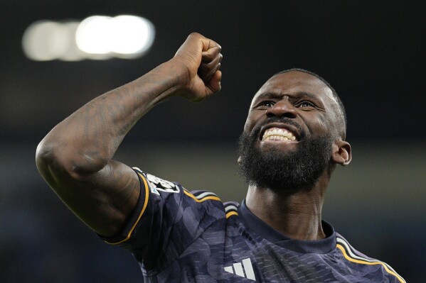 Real Madrid's Antonio Rudiger celebrates at the end of the Champions League quarterfinal second leg soccer match between Manchester City and Real Madrid at the Etihad Stadium in Manchester, England, Wednesday, April 17, 2024. (AP Photo/Dave Shopland)