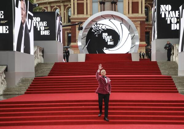Daniel Craig poses for photographers upon arrival for the World premiere of the film 'No Time To Die', in London Tuesday, Sept. 28, 2021. (Photo by Vianney Le Caer/Invision/AP)
