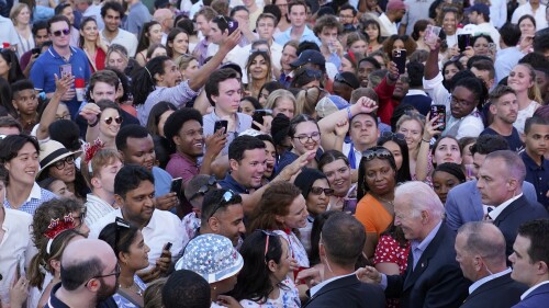 President Joe Biden greets the crowd on the South Lawn of the White House in Washington, Tuesday, July 4, 2023, during a barbecue with active-duty military families to celebrate the Fourth of July. (AP Photo/Susan Walsh)