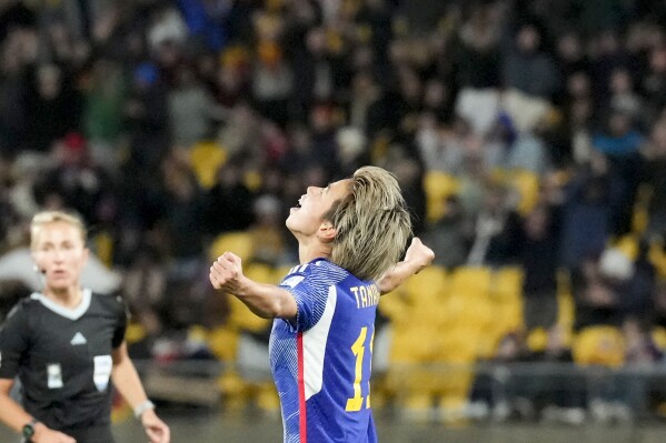 Japan's Mina Tanakacelebrates after scoring her side's 4th goal during the Women's World Cup Group C soccer match between Japan and Spain in Wellington, New Zealand, Monday, July 31, 2023. (AP Photo/John Cowpland)