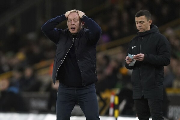 Nottingham Forest manager Steve Cooper rues a missed chance during the English Premier League soccer match between Nottingham Forest and Wolverhampton Wanderers at the Molineux Stadium in Wolverhampton, England, Saturday Dec. 9, 2023. (Mike Egerton/PA via AP)