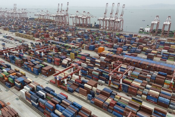 Shipping containers are seen ready for transport at the Guangzhou Port in the Nansha district in southern China's Guangdong province, April 17, 2025. (AP Photo/Ng Han Guan, File)