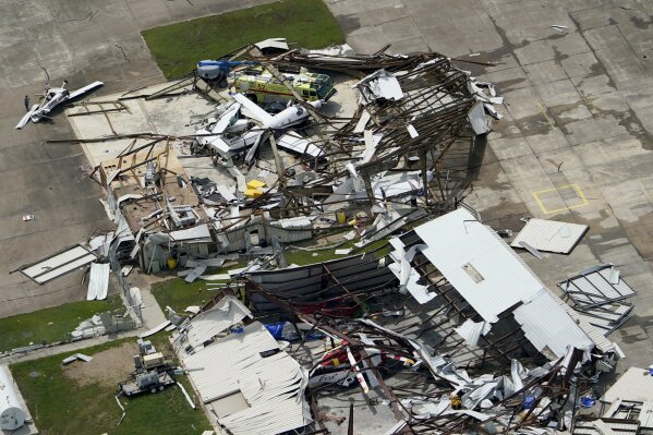 A airplane hangar is destroyed Thursday, Aug. 27, 2020, after Hurricane Laura went through the area near Lake Charles, La. (AP Photo/David J. Phillip)