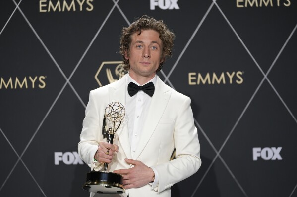 Jeremy Allen White, winner of the award for outstanding lead actor in a comedy series for "The Bear," poses in the press room during the 75th Primetime Emmy Awards on Monday, Jan. 15, 2024, at the Peacock Theater in Los Angeles. (AP Photo/Ashley Landis)