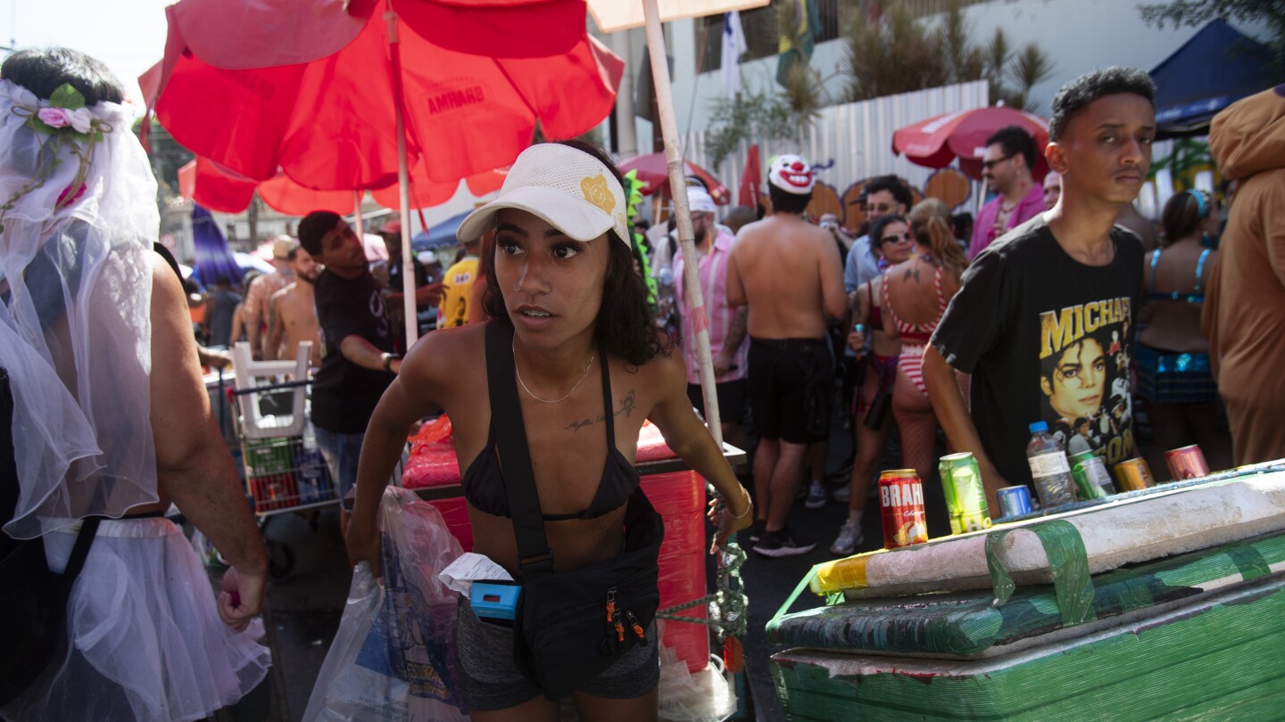 Street vendors dispense the party fuel for Rio’s Carnival, but face pushback as their numbers grow
