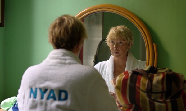 This image released by Netflix shows Annette Bening as Diana Nyad in a scene from the film "Nyad." (Netflix via AP)