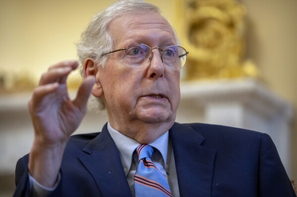 FILE - Senate Minority Leader Mitch McConnell of Ky., speaks during an interview with the Associated Press at his office in the Capitol, Nov. 6, 2023 in Washington. The Senate is heading for a vote on a temporary government funding package as lawmakers sought to keep the holiday season free from any suspense over a government shutdown. Senators were trying to speed forward on the funding package on Wednesday. (AP Photo/Mark Schiefelbein, File)