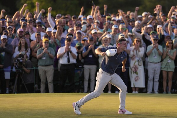 Rory McIlroy, of Northern Ireland, reacts after winning in a playoff against Justin Rose after the final round at the Masters golf tournament, Sunday, April 13, 2025, in Augusta, Ga. (AP Photo/Ashley Landis)