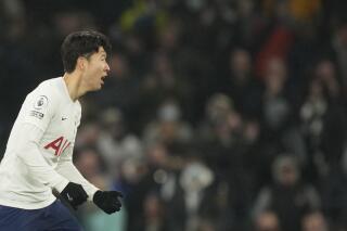 Tottenham's Son Heung-min celebrates after scoring his side's second goal during the English Premier League soccer match between Tottenham Hotspur and Liverpool at the Tottenham Hotspur Stadium in London, Sunday, Dec. 19, 2021. (AP Photo/Frank Augstein)