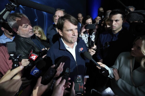 Jim Farley, President and Chief Executive Officer, Ford Motor Company speaks to reporters about the UAW contract talks at the North American International Auto Show in Detroit, Wednesday, Sept. 13, 2023. (AP Photo/Paul Sancya)