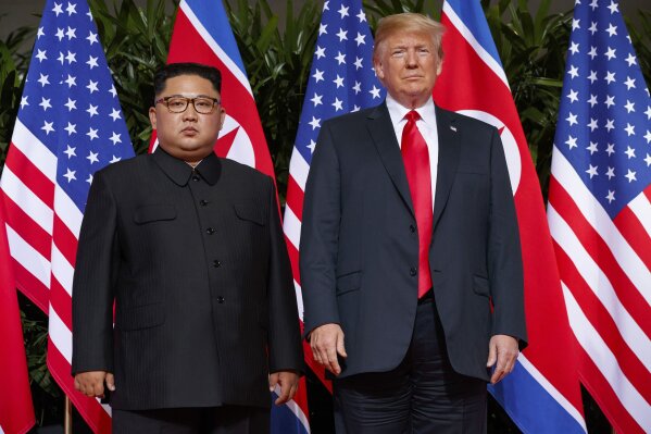 FILE - In this June 12, 2018, file photo, U.S. President Donald Trump, right, meets with North Korean leader Kim Jong Un on Sentosa Island, in Singapore. North Korea on Saturday, July 4, 2020, reiterated it has no immediate plans to resume nuclear negotiations with the United States unless Washington discards what it describes as "hostile" polices toward Pyongyang. (AP Photo/Evan Vucci, File)