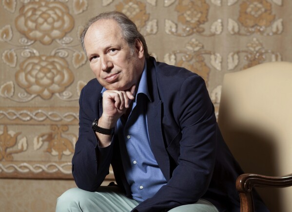 FILE - Composer Hans Zimmer poses for a portrait on July 10, 2019, at the Montage Hotel in Beverly Hills, Calif. Zimmer’s film scores have soundtracked magic movie moments in “The Lion King," "The Dark Knight” and both new “Dune” movies, to name a few. This fall, the “Hans Zimmer Live” tour will hit U.S. and Canada, marking the first time Zimmer has performed in North America in seven years. (Photo by Rebecca Cabage/Invision/AP, File)