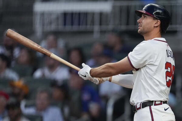 Atlanta Braves' Matt Olson watches his three-run home run in the fourth inning of a baseball game against the Chicago Cubs Tuesday, May 14, 2024, in Atlanta. (AP Photo/John Bazemore)