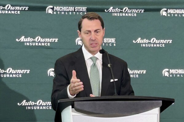 Michigan State athletic director J Batt speaks during a news conference, Wednesday, June 4, 2025, in East Lansing, Mich. (AP Photo/Larry Lage)