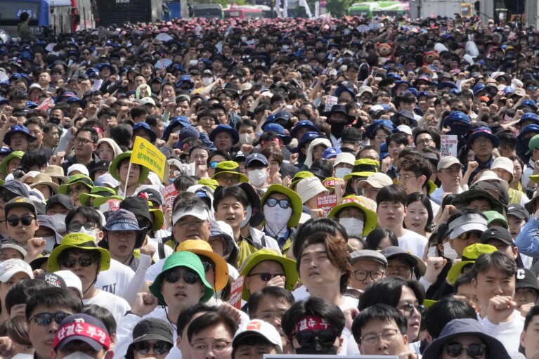  of the Korean Federation of Trade Unions gather for a rally on Labor Day in Seoul, South Korea, Wednesday, May 1, 2024. (AP Photo/Ahn Young-joon)