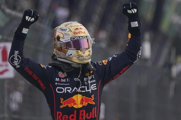 Red Bull driver Max Verstappen, of the Netherlands, celebrates his victory in the Formula One Mexico Grand Prix at the Hermanos Rodriguez racetrack in Mexico City, Sunday, Oct. 30, 2022. (AP Photo/Fernando Llano)