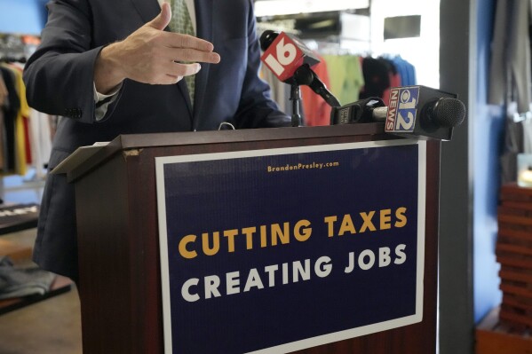 Northern District Public Service Commissioner Brandon Presley, the Democratic nominee for Mississippi governor, gives a news conference, June 22, 2023, at a locally owned clothing store in Jackson, Miss. (AP Photo/Rogelio V. Solis, File)