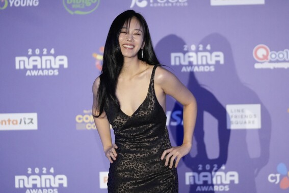 FILE -South Korean singer BIBI arrives for the red carpet of the MAMA Awards in Osaka, western Japan, Nov. 23, 2024. (AP Photo/Hiro Komae), File)