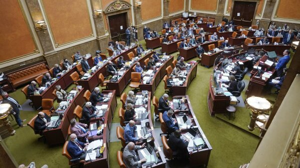 FILE - The Utah House of Representatives is shown on Feb. 26, 2021, in Salt Lake City. Utah lawmakers have voted to require every cellphone and tablet sold there to automatically block pornography, the conservative state's most recent move targeting online porn and one that critics call a significant intrusion on free speech. (AP Photo/Rick Bowmer, File)