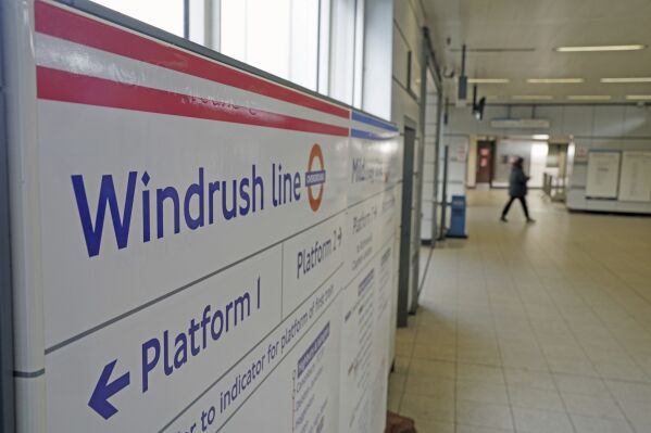 A sign for the new Windrush line which was unveiled by Mayor of London Sadiq Khan in London Thursday, Feb. 15, 2024. London Overground services will be split into separate lines, which will be given individual names and colours to make the network easier to navigate. The six lines will be named Lioness, Mildmay, Windrush, Weaver, Suffragette and Liberty (Jonathan Brady/PA via AP)
