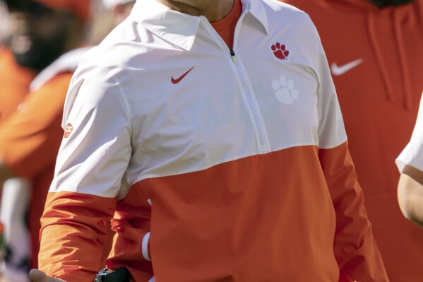 Clemson head coach Dabo Swinney looks on during the first half of an NCAA college football game against Notre Dame, Saturday, Nov. 4, 2023, in Clemson, S.C. (AP Photo/Jacob Kupferman)