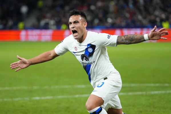 Inter Milan's Lautaro Martinez celebrates after scoring his side's opening goal from a penalty kick during the group D Champions League soccer match between Salzburg and Inter Milan in Salzburg, Austria, Wednesday, Nov. 8, 2023. (AP Photo/Petr David Josek)