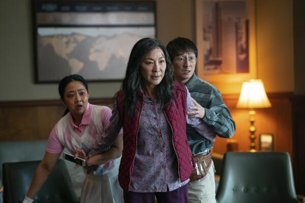 This image released by A24 Films shows, from left, Stephanie Hsu, Michelle Yeoh and Ke Huy Quan in a scene from, "Everything Everywhere All At Once," which will open the SXSW Film Festival on March 11, 2022 in Austin, Texas. (Allyson Riggs/A24 Films via AP)