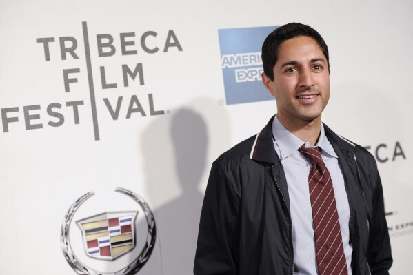 FILE - Actor Maulik Pancholy attends the premiere of "Trishna" during the 2012 Tribeca Film Festival on Friday, April 27, 2012 in New York. A Pennsylvania school district has canceled an upcoming appearance by actor and children's book author Pancholy after district leaders cited concerns about what they described as his activism and “lifestyle.” Pancholy, who is gay, was scheduled to speak against bullying during a May 22, 2024, assembly at Mountain View Middle School in Cumberland County. (AP Photo/Evan Agostini, File)
