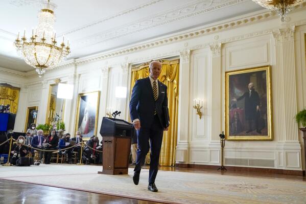 President Joe Biden leaves after a news conference in the East Room of the White House in Washington, Wednesday, Jan. 19, 2022. (AP Photo/Susan Walsh)