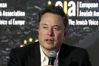 FILE - Elon Musk addresses the European Jewish Association's conference, in Krakow, Poland, Monday, Jan. 22, 2024. Musk鈥檚 brain implant company Neuralink has moved its legal corporate home from Delaware to Nevada. The move came just over a week after a Delaware judge struck down Musk鈥檚 $55.8 billion pay package as CEO of Tesla. Neuralink became a Nevada company on Thursday, Feb. 8. (APPhoto/Czarek Sokolowski, File)