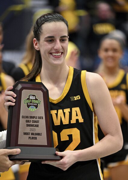 Iowa's Caitlin Clark is named Most Valuable Player after the final game against Kansas State in the NCAA college basketball Gulf Coast Showcase, Sunday, Nov. 26, 2023, in Estero, Fla. (AP Photo/Chris Tilley)