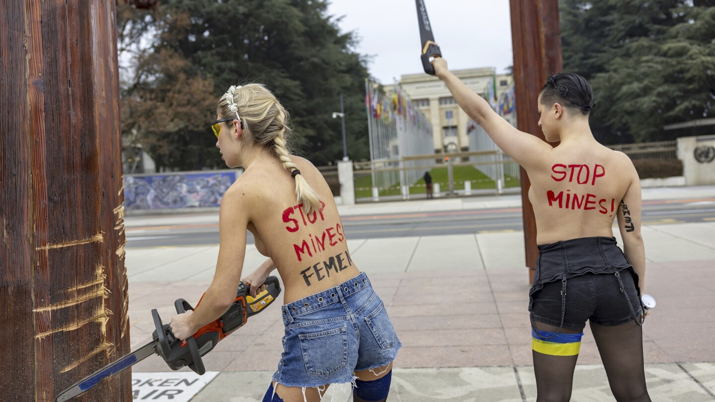 ukrainian family nudist contest Topless women protesting the Ukraine war are detained for vandalizing  sculpture near UN building | AP News